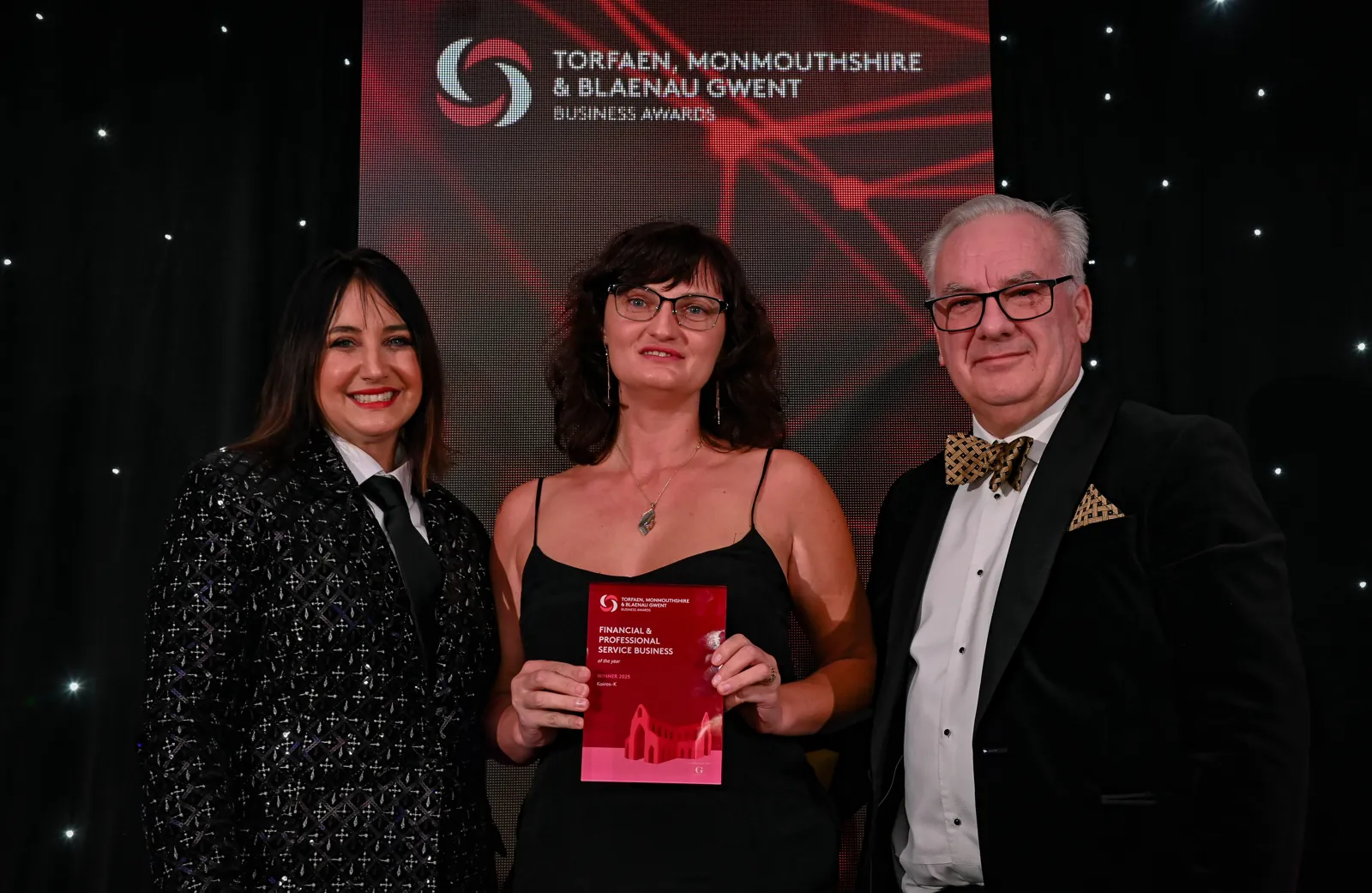 Larysa Brovchuk receiving the Financial & Professional Service Business of the Year 2025 award for Kairos-K