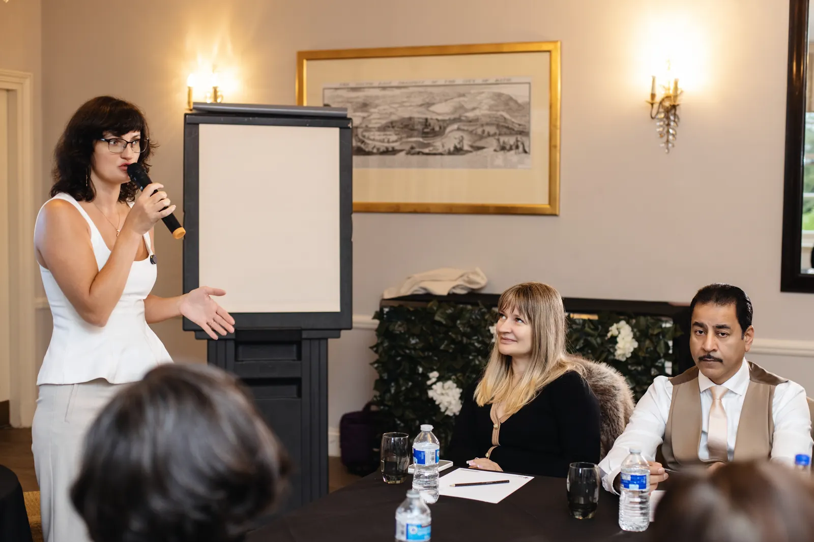 Larysa Brovchuk speaking at a business event
