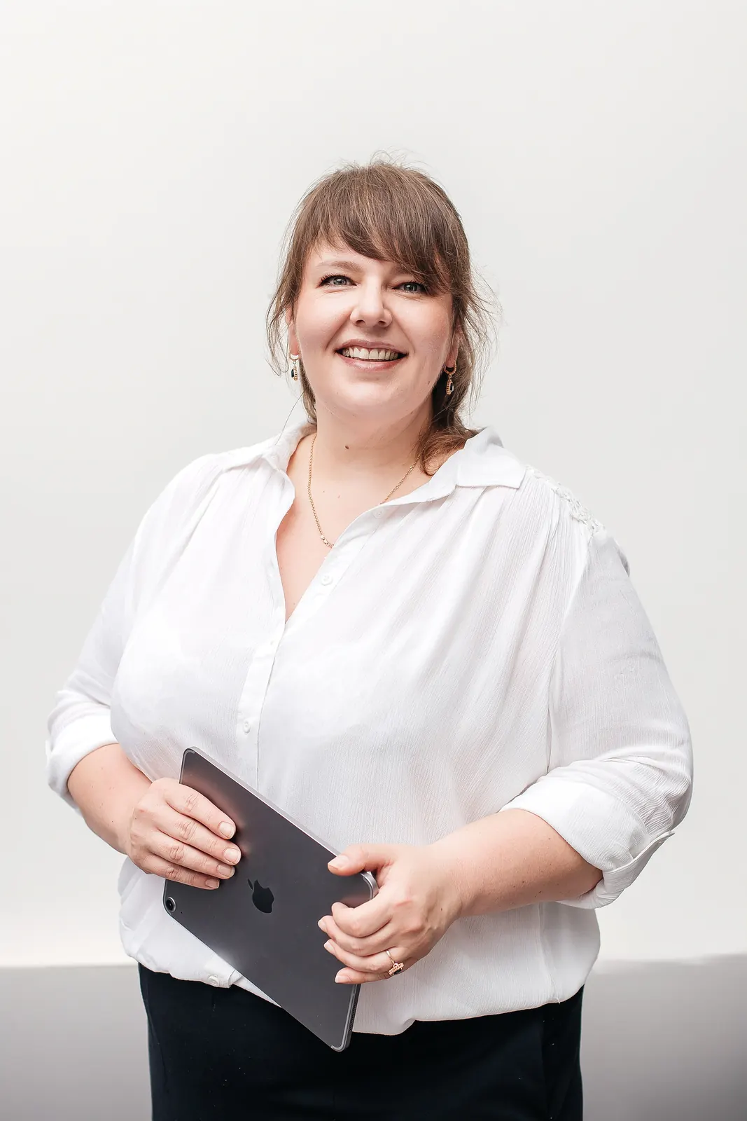 A Kairos-K accountant reviewing a client's processes on a tablet